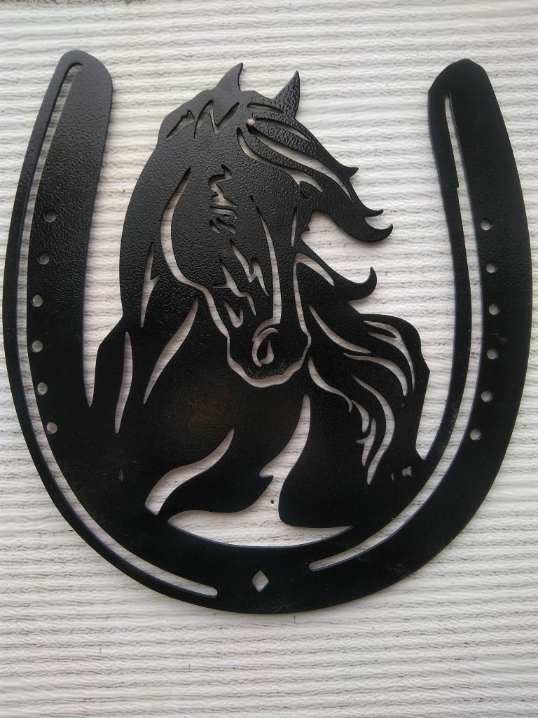 Wandbild Pferdekopf im Hufeisen STAKO Stallsysteme